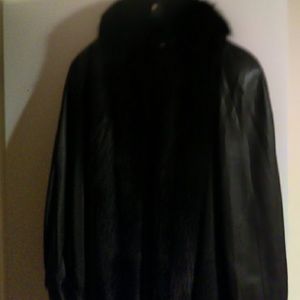 Long leather coat with fur trim